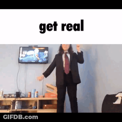Man In Suit Dancing In Front Of TV Saying Get Real GIF