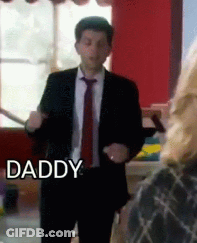 Man In Suit Dancing In Front Of Woman Saying Daddy GIF
