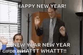 Man In Suit Dancing In Office While Another Man Looks On GIF