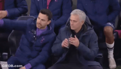 Man In Suit Dancing On Soccer Field With Fox Logo GIF