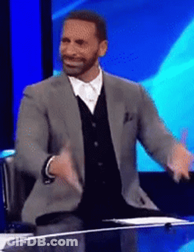 Man In Suit Dancing On Stage GIF