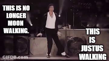 Man In Suit Dancing On Stage GIF
