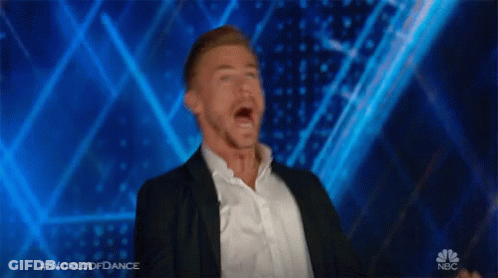 Man In Suit Dancing On World Of Dance Stage GIF