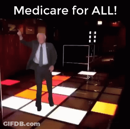 Man In Suit Dancing Saying Medicare For All GIF