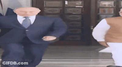 Man In Suit Dancing With Another Man GIF