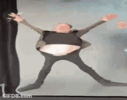 Man In Suit Dancing With Big Belly GIF