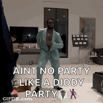 Man In Suit Dancing With Diddy Party Words GIF