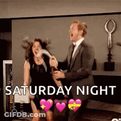 Man In Suit Dancing With Woman In Black Dress GIF