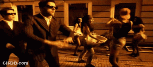 Man In Suit Dancing With Woman In White Dress GIF