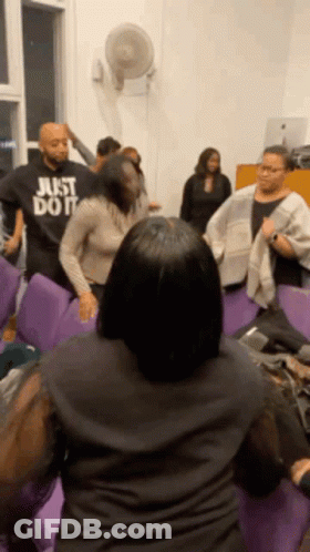 Man In Suit Dancing With Woman Purple Dress GIF