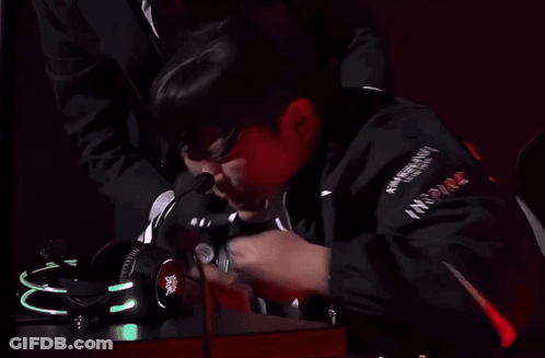 Man In Suit Drinking Alcohol Bottle GIF