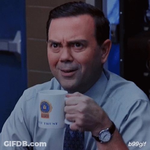 Man In Suit Drinking Coffee Mug Saying Police Trust GIF