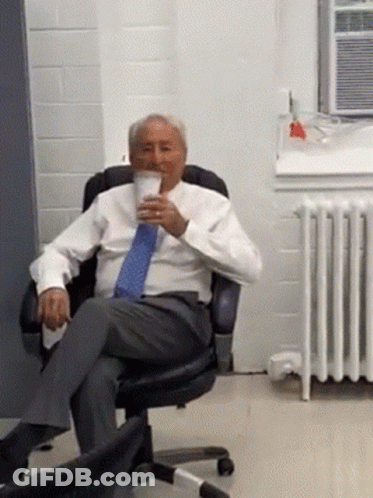 Man In Suit Drinking Coffee GIF