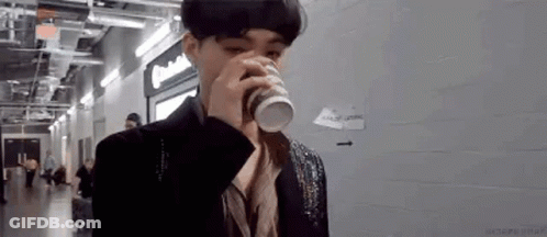 Man In Suit Drinking Coffee GIF