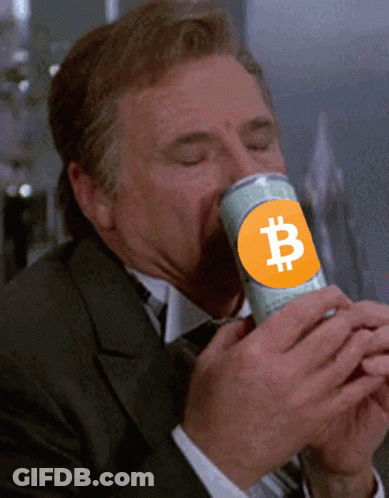 Man In Suit Drinking From Can With B Logo GIF