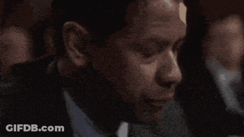 Man In Suit Drinking From Glass Saying God Help Me GIF