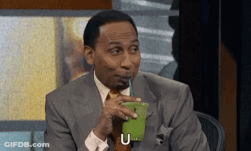 Man In Suit Drinking Green Smoothie GIF