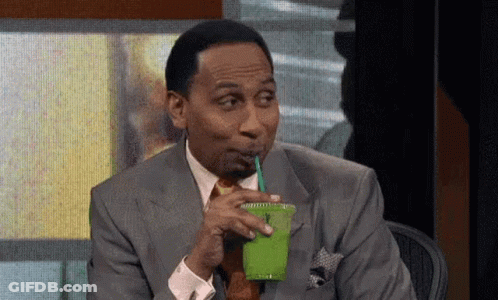 Man In Suit Drinking Green Smoothie GIF