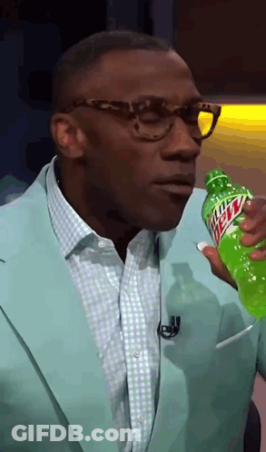 Man In Suit Drinking Mountain Dew GIF