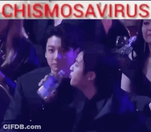 Man In Suit Drinking Water In Crowd GIF