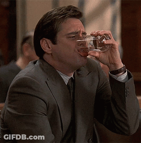Man In Suit Drinking Wine GIF