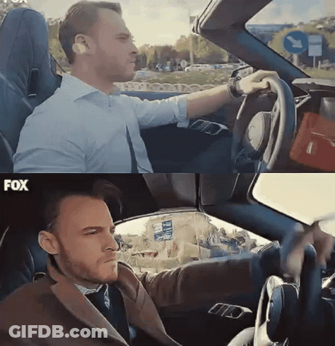 Man In Suit Driving Car Saying Fox GIF