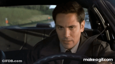 Man In Suit Driving Car With Make A GIF