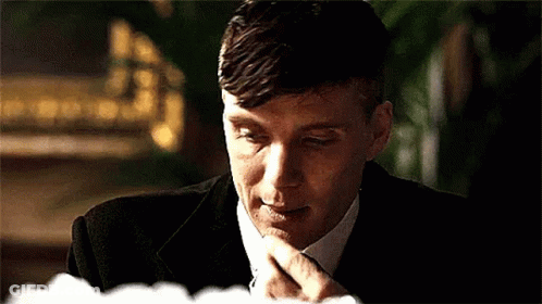 Man In Suit Eating Food GIF