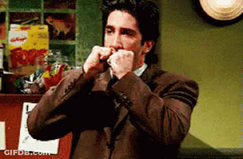 Man In Suit Eating Kellogg's Cereal GIF