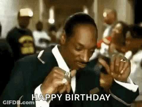 Man In Suit Eating With Fork Says Happy Birthday GIF