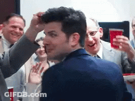 Man In Suit Getting Hair Blow Dried GIF