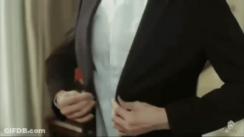 Man In Suit Getting Ready To Go Out GIF