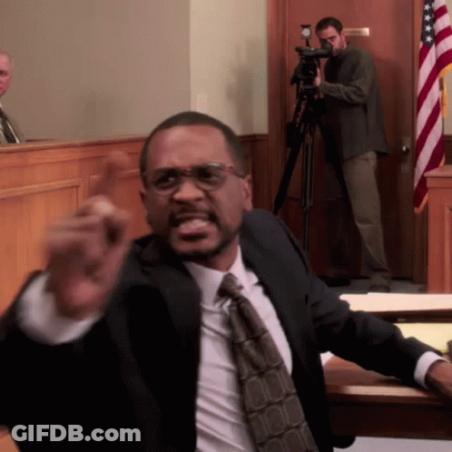 Man In Suit Giving Courtroom Speech GIF