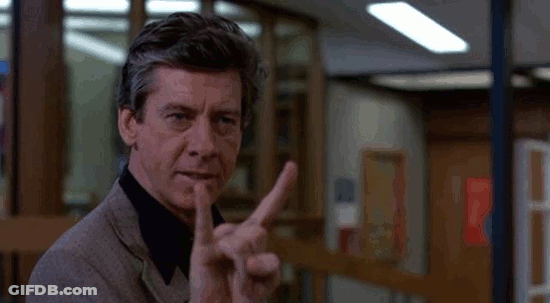 Man In Suit Giving Middle Finger GIF
