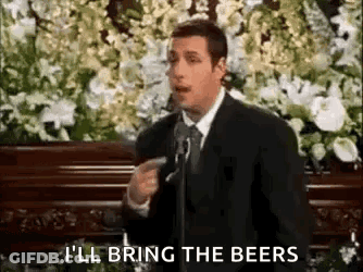 Man In Suit Giving Speech At Funeral GIF