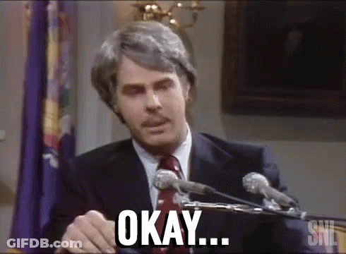 Man In Suit Giving Speech At Microphones Saying Okay GIF