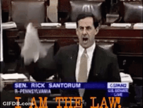 Man In Suit Giving Speech In Congress Says I Am The Law GIF