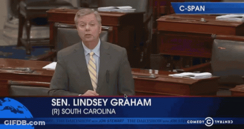 Man In Suit Giving Speech In Front Of Screen Saying Sen Lindsey Graham GIF