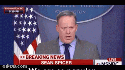 Man In Suit Giving Speech In Front Of White House Sign GIF