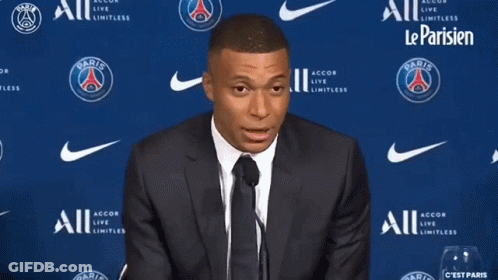 Man In Suit Giving Speech Le Football Il A Change GIF