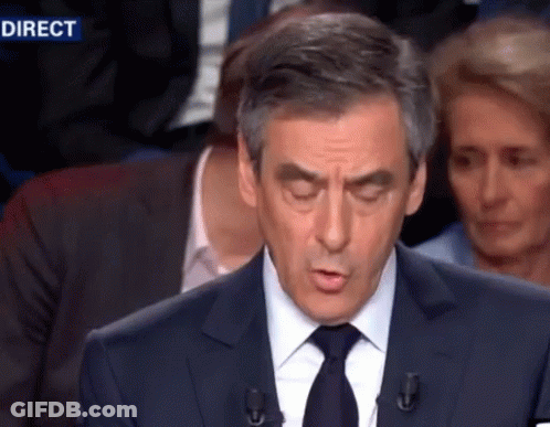 Man In Suit Giving Speech With Direct Behind GIF