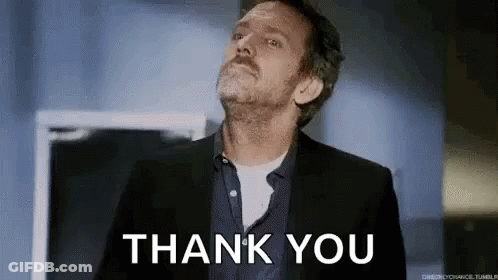 Man In Suit Giving Thank You Gesture GIF