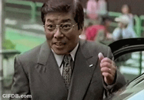 Man In Suit Giving Thumbs Up GIF