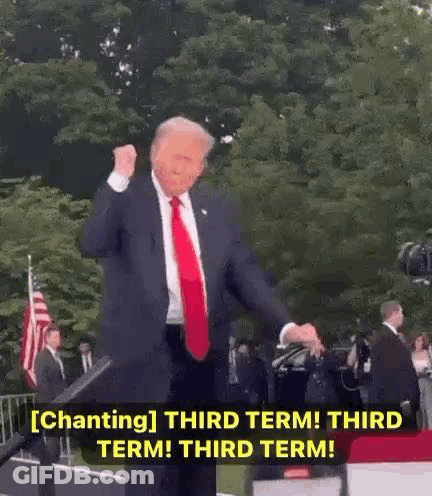 Man In Suit Giving Thumbs Up At Microphone GIF
