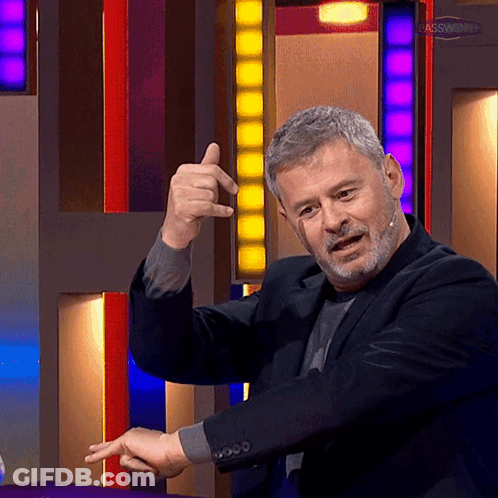Man In Suit Giving Thumbs Up GIF