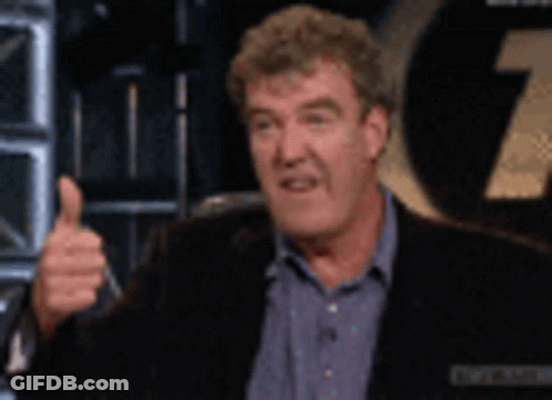 Man In Suit Giving Thumbs Up GIF