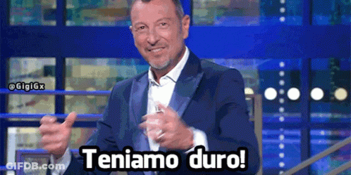 Man In Suit Giving Thumbs Up Teniamo Duro GIF