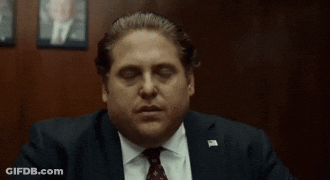 Man In Suit Hand On Face Eyes Closed GIF