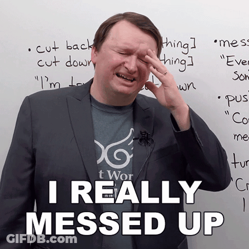 Man In Suit Hand On Forehead Saying I Really Messed Up GIF