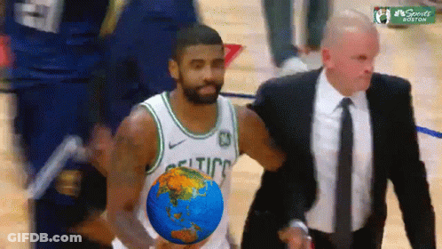 Man In Suit Helping Celtics Player Carry Globe GIF